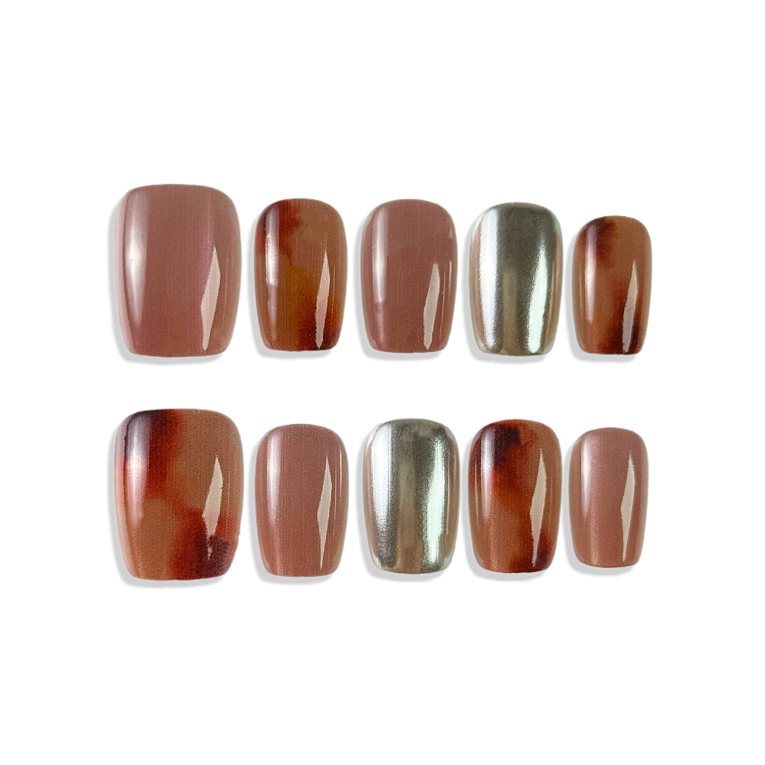 Set of nail polish samples in brown and silver on a white background