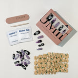 Black and Purple skulls , ghosts, and black cat Press-On Nails