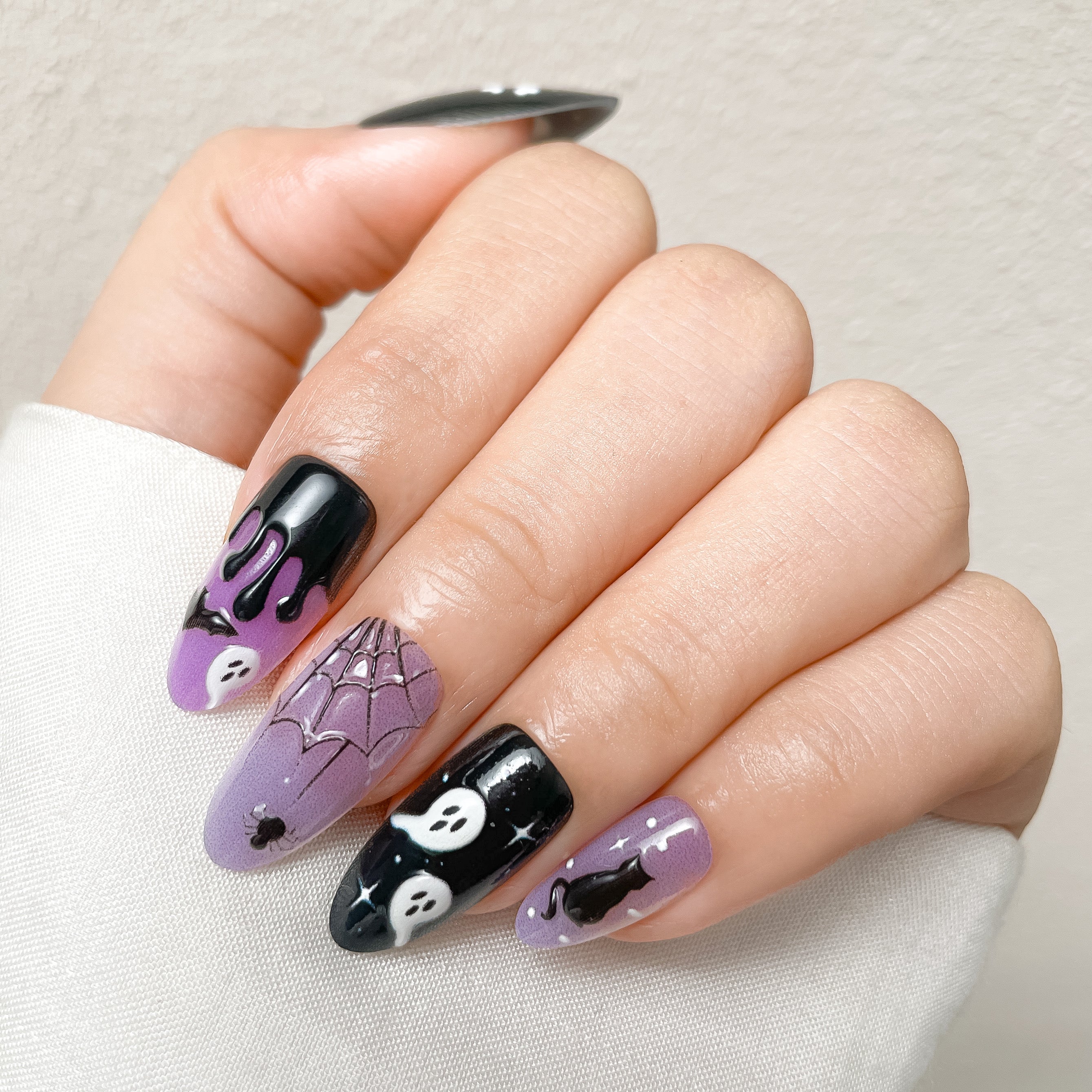 Black and Purple skulls , ghosts, and black cat Press-On Nails