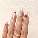 Shimmery Nude Base With Golden Starbursts and 3D Red Hearts Press-On Nails